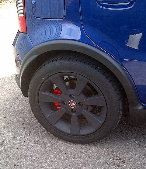 Rear plasti dipped wheel and red caliper. 100hp