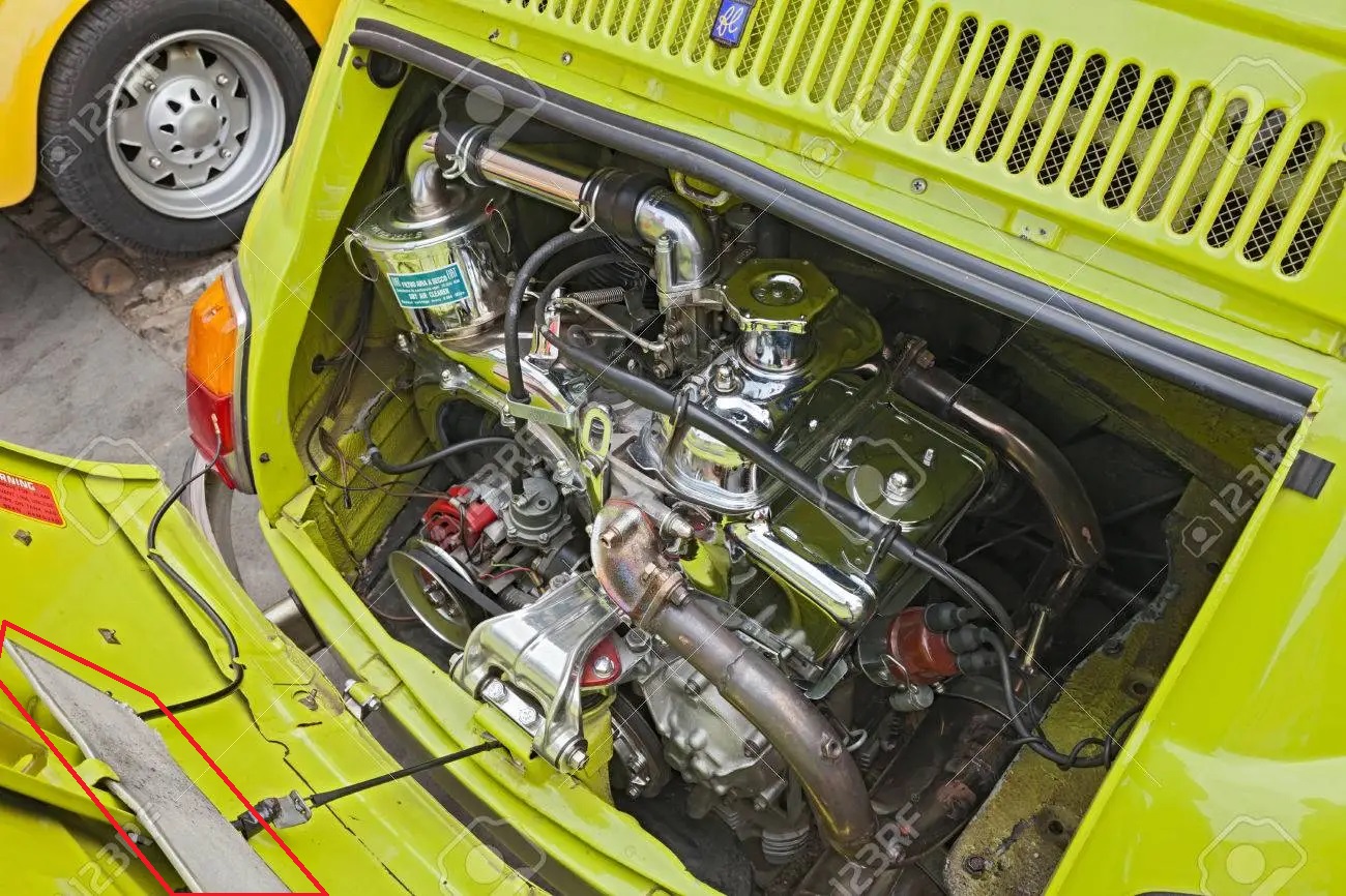 33914338-shiny-chromed-engine-of-a-tuned-vintage-italian-car-fiat-500-in-classic-cars-rally-du...jpg