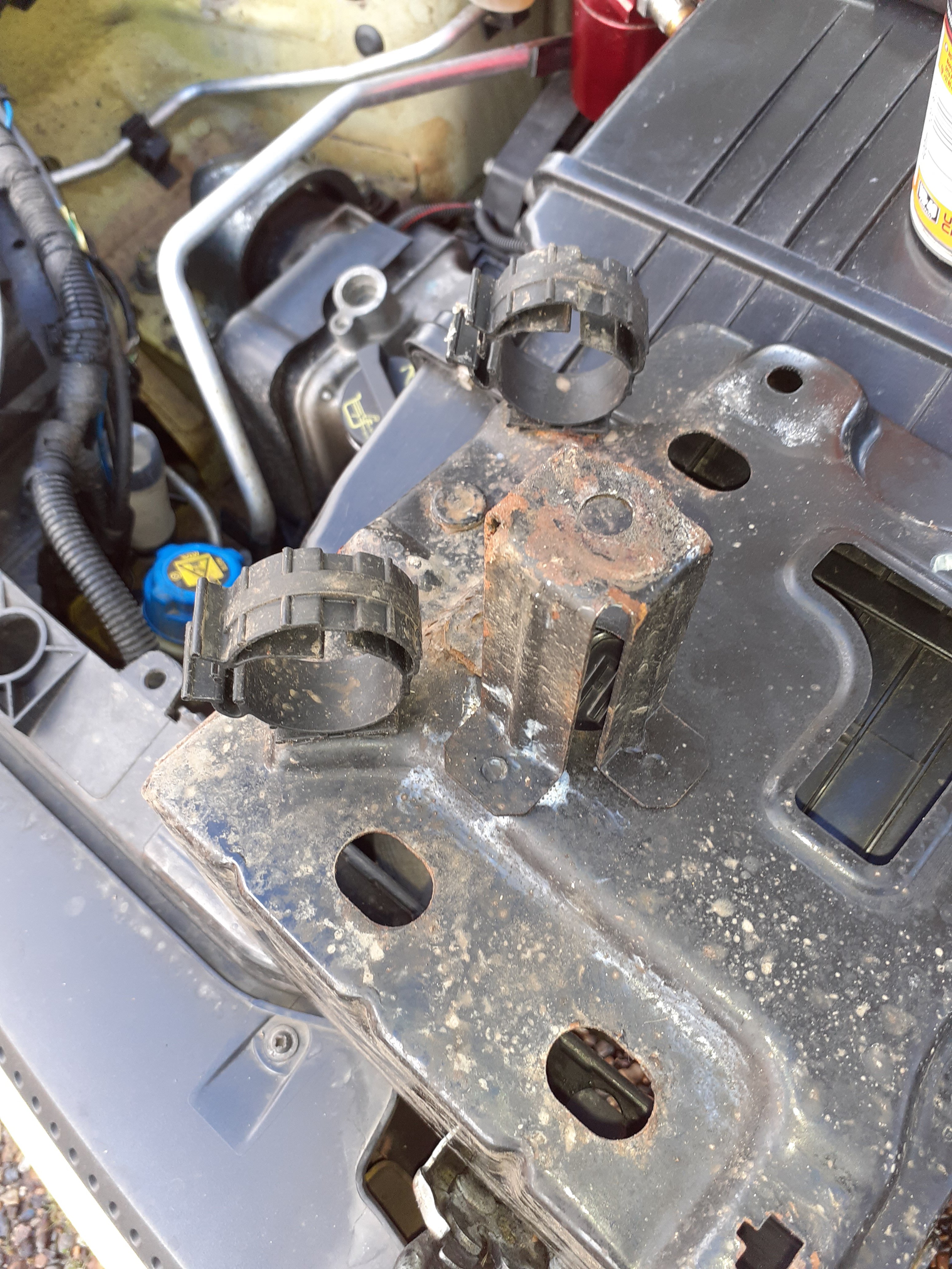 Wiring clips under battery box.jpg