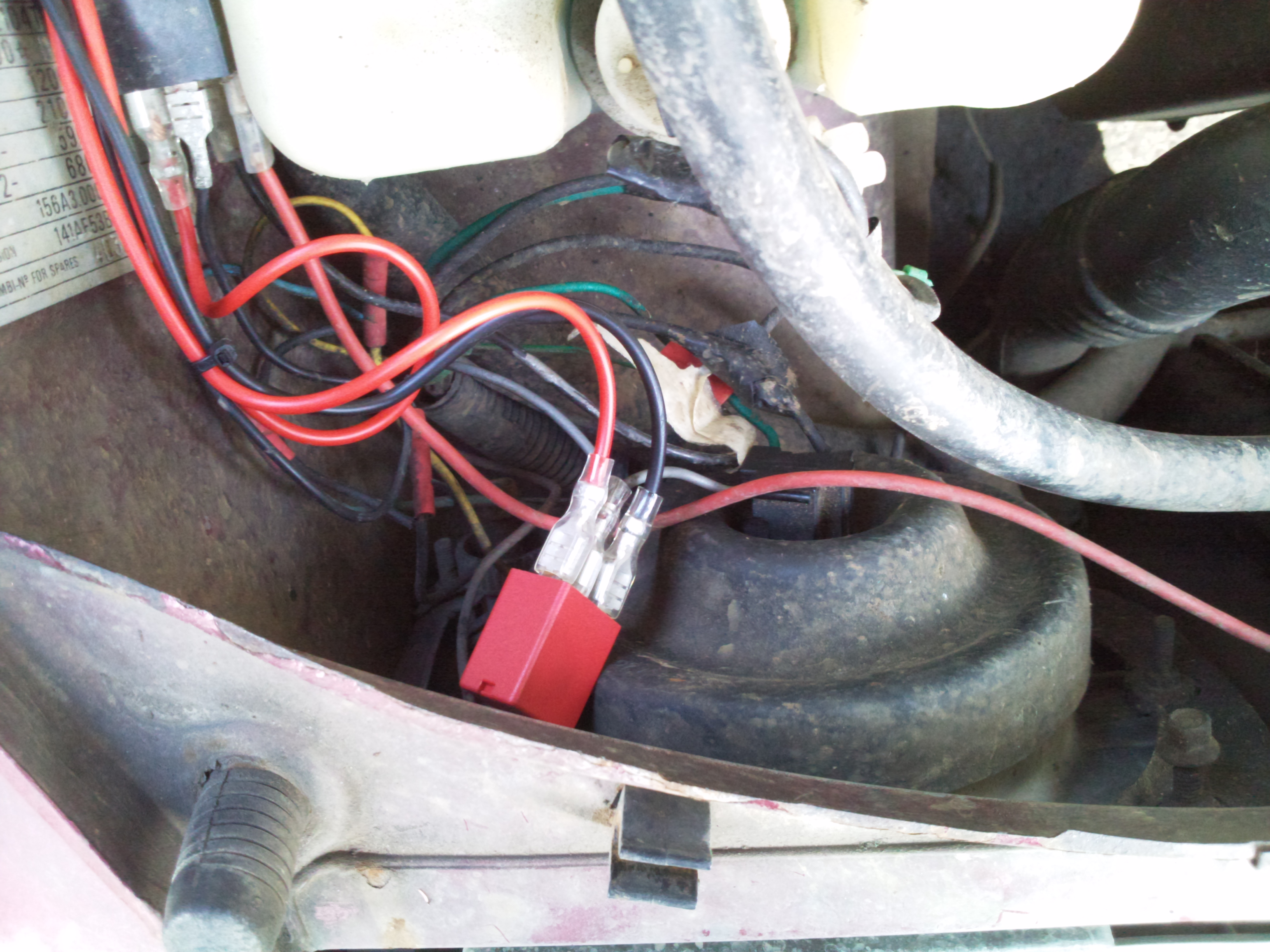 Offside inner wing/headlight under bonnet