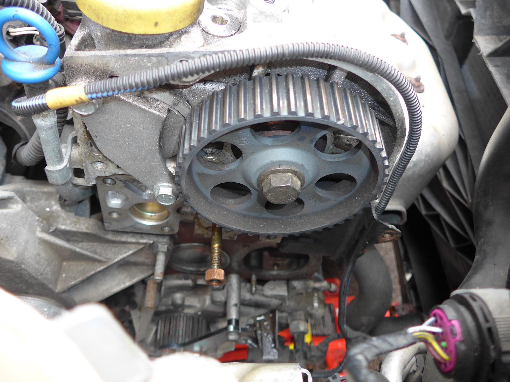 Old belt, waterpump &amp; tensioner removed