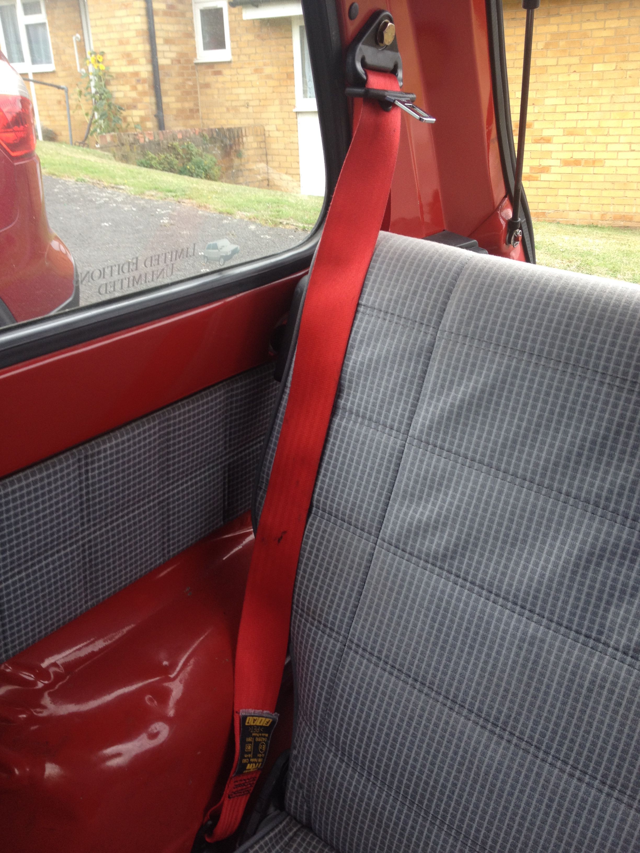 Red Seat Belt Fitted